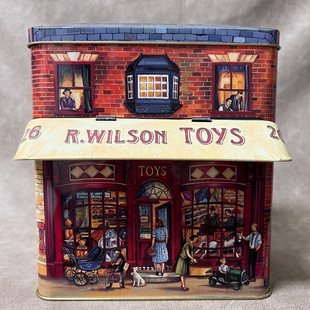 VTG Metal Tin Toy Shop Front Canister With Canopy. Dept 56 9” Tall 5”W.& D.